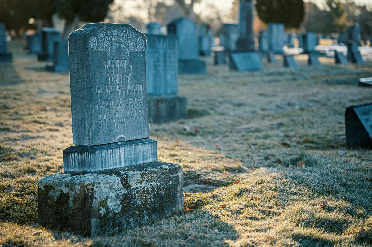 memorial headstone in graveyard